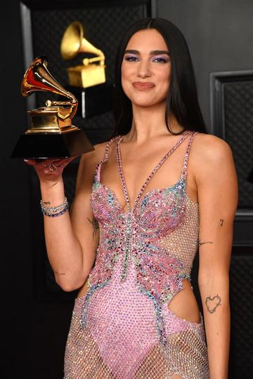 Dua Lipa, winner of Best Pop Vocal Album for ‘Future Nostalgia’, poses in the media room during the 63rd Annual GRAMMY Awards at Los Angeles Convention Center on March 14, 2021 in Los Angeles, California. (Photo by Kevin Mazur/Getty Images for The Recording Academy )