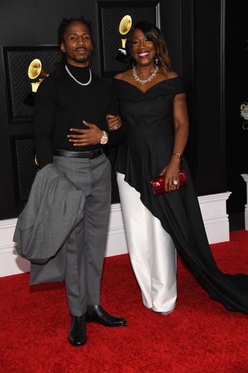 (L-R) D Smoke and Jackie Gouche-Farris attend the 63rd Annual GRAMMY Awards at Los Angeles Convention Center on March 14, 2021 in Los Angeles, California. (Photo by Kevin Mazur/Getty Images for The Recording Academy )