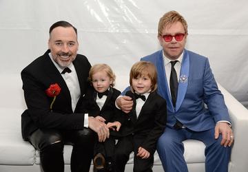 LOS ANGELES, CA - FEBRUARY 22:  (L-R) David Furnish, Elijah Furnish-John, Zachary Furnish-John, and Sir Elton John attend the 23rd Annual Elton John AIDS Foundation Academy Awards Viewing Party on February 22, 2015 in Los Angeles, California.  (Photo by Michael Kovac/Getty Images for EJAF)