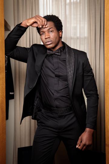 Actor Sope Dirisu nominated for EE Rising Star Award poses in his award show look for the EE British Academy Film Awards 2021  on April 11, 2021 in London, England. Due to COVID-19 restrictions nominees will be attending virtually alongside a virtual audience.    (Photo by Tristan Fewings/Getty Images for ABA)
