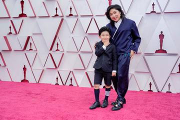 (L-R) Alan S. Kim and Christina Oh attend the 93rd Annual Academy Awards at Union Station on April 25, 2021 in Los Angeles, California. (Photo by Chris Pizzello-Pool/Getty Images)