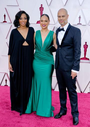 (L-R) Dionne Harmon, Jeannae Rouzan Clay, and Jesse Collins attend the 93rd Annual Academy Awards at Union Station on April 25, 2021 in Los Angeles, California. (Photo by Chris Pizzello-Pool/Getty Images)