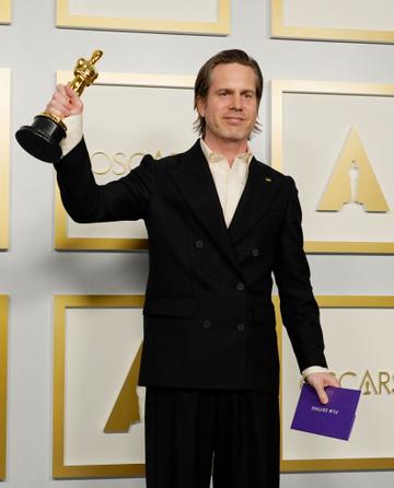 Mikkel E. G. Nielsen, winner of Best Film Editing for "Sound of Metal," poses in the press room during the Oscars on Sunday, April 25, 2021, at Union Station in Los Angeles. (Photo by Chris Pizzello-Pool/Getty Images)