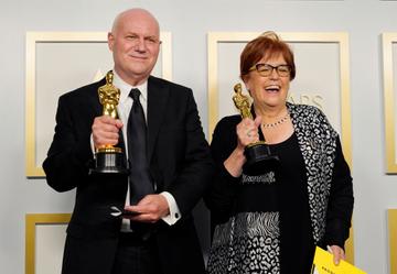 Donald Graham Burt and Jan Pascale, winners of Best Production Design for "Mank", pose in the press room during the Oscars on Sunday, April 25, 2021, at Union Station in Los Angeles. (Photo by Chris Pizzello-Pool/Getty Images)