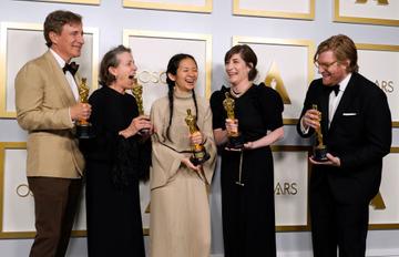 Peter Spears, Frances McDormand, Chloe Zhao, Mollye Asher, and Dan Janvey, winners of Best Picture for "Nomadland," pose in the press room at the Oscars on Sunday, April 25, 2021, at Union Station in Los Angeles. (Photo by Chris Pizzello-Pool/Getty Images)