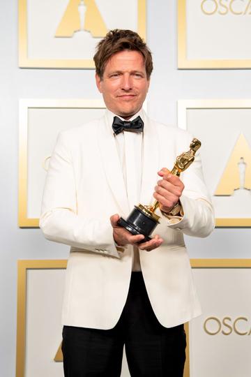 Thomas Vinterberg, winner of the International Feature Film award for 'Another Round,' poses in the press room during the 93rd Annual Academy Awards at Union Station on April 25, 2021 in Los Angeles, California. (Photo by Matt Petit/A.M.P.A.S. via Getty Images)
