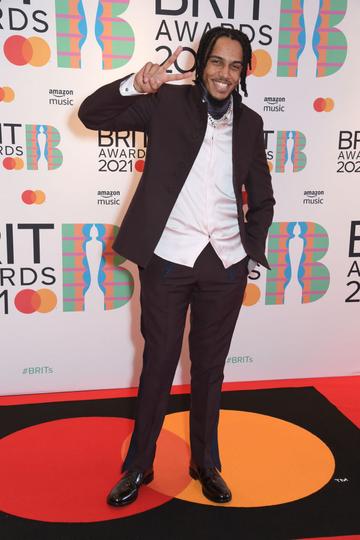 AJ Tracey arrives at The BRIT Awards 2021 at The O2 Arena on May 11, 2021 in London, England.  (Photo by David M. Benett/Dave Benett/Getty Images)