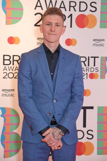 Nathan Evans arrives at The BRIT Awards 2021 at The O2 Arena on May 11, 2021 in London, England.  (Photo by David M. Benett/Dave Benett/Getty Images)