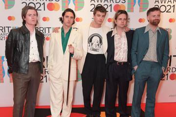 (L-R) Conor Curley, Carlos O'Connell, Grian Chatten, Conor Deegan III and Tom Coll of Fontaines D.C. arrive at The BRIT Awards 2021 at The O2 Arena on May 11, 2021 in London, England.  (Photo by David M. Benett/Dave Benett/Getty Images)