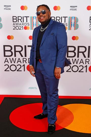 S1MBA attends The BRIT Awards 2021 at The O2 Arena on May 11, 2021 in London, England. (Photo by JMEnternational/JMEnternational for BRIT Awards/Getty Images)