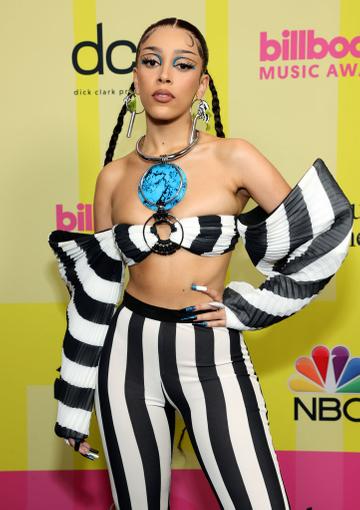 Doja Cat poses backstage for the 2021 Billboard Music Awards, broadcast on May 23, 2021 at Microsoft Theater in Los Angeles, California. (Photo by Rich Fury/Getty Images for dcp)