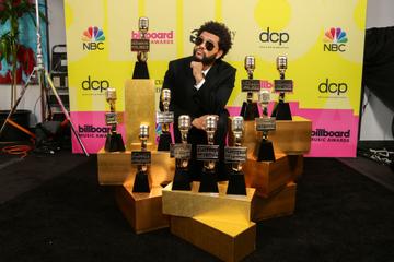 The Weeknd, winner of the Top Artist Award, Top Male Artist Award, Top Hot 100 Artist Award, Top Radio Songs Artist Award, Top R&amp;B Artist Award, Top R&amp;B Album Award, Top Billboard 200 Album Award, Top Hot 100 Song Presented by Rockstar Award, Top Radio Song Award, and Top R&amp;B Song Award poses backstage for the 2021 Billboard Music Awards, broadcast on May 23, 2021 at Microsoft Theater in Los Angeles, California. (Photo by Rich Fury/Getty Images for dcp)