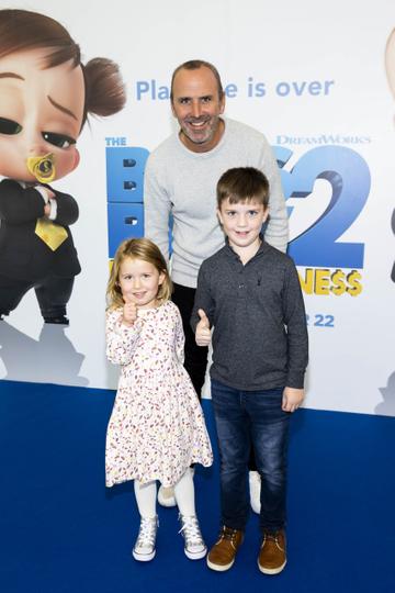 Fergal Lynch and Fia Lynch (4) with James Boyle (8) from Clontarf pictured at a special preview screening of The Boss Baby 2: Family Business at Odeon Point Square, Dublin. Picture Andres Poveda