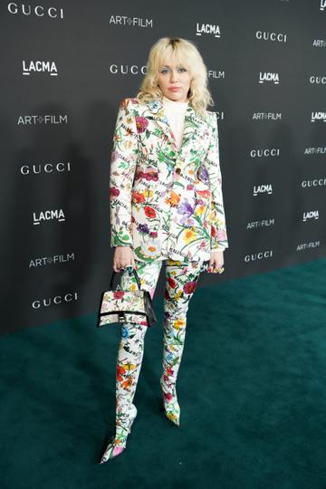 Miley Cyrus, wearing Gucci, attends the 10th Annual LACMA ART+FILM GALA honoring Amy Sherald, Kehinde Wiley, and Steven Spielberg presented by Gucci at Los Angeles County Museum of Art on November 06, 2021 in Los Angeles, California. (Photo by Presley Ann/Getty Images for LACMA)