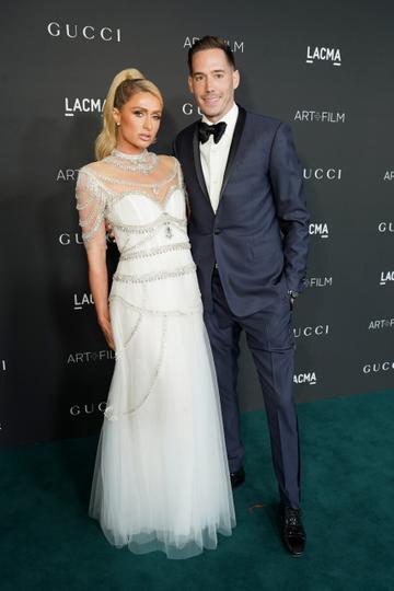 Paris Hilton and Carter Reum attend the 10th Annual LACMA ART+FILM GALA honoring Amy Sherald, Kehinde Wiley, and Steven Spielberg presented by Gucci at Los Angeles County Museum of Art on November 06, 2021 in Los Angeles, California. (Photo by Presley Ann/Getty Images for LACMA)