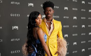Quenlin Blackwell and Lil Nas X wearing Gucci, attend the 10th Annual LACMA ART+FILM GALA honoring Amy Sherald, Kehinde Wiley, and Steven Spielberg presented by Gucci at Los Angeles County Museum of Art on November 06, 2021 in Los Angeles, California. (Photo by Presley Ann/Getty Images for LACMA)