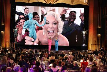 Ted Lasso actress  Hannah Waddingham and and the cast  accepts Outstanding Performance by an Ensemble in a Comedy Series with presenters Lisa Kudrow and Mira.(Robert Gauthier / Los Angeles Times via Getty Images)
