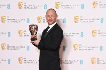 Justin Raleigh, accepting the Best Makeup & Hair award for "The Eyes Of Tammy Faye", poses in the winners room at the EE British Academy Film Awards 2022 at Royal Albert Hall on March 13, 2022 in London, England.  (Photo by David M. Benett/Dave Benett/Getty Images)