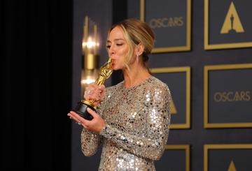 Sian Heder, winner of the Writing (Adapted Screenplay) Award for ‘CODA’ kisses her award in appreciation of the honour at the 94th Annual Academy Awards at Dolby Theatre on March 27, 2022 in Hollywood, California. (Photo by Mike Coppola/Getty Images)