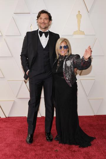 (L-R) Bradley Cooper and Gloria Campano attend the 94th Annual Academy Awards at Hollywood and Highland on March 27, 2022 in Hollywood, California. (Photo by Mike Coppola/Getty Images)