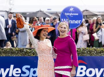 Clare Conlon (age 26) from Armagh wearing a dress from Never Fully Dressed with shoes and accessories from Zara and Hat from Hats in Belfast was named winner of the Dunboyne Castle Most Stylish Lady event at Fairyhouse Racecourse, which took place on Easter Monday, 18th April pictured with guest judge Nina Carberry. An exciting day in the racing and style calendar, the €500,000 BoyleSports Irish Grand National and Most Stylish Lady is the highlight of the festival. Picture Andres Poveda