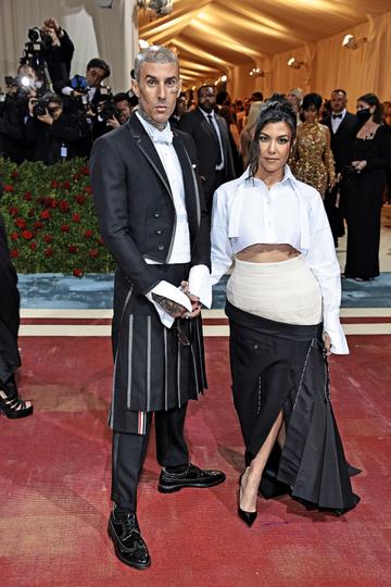 NEW YORK, NEW YORK - MAY 02: (L-R) Travis Barker and Kourtney Kardashian attend The 2022 Met Gala Celebrating "In America: An Anthology of Fashion" at The Metropolitan Museum of Art on May 02, 2022 in New York City. (Photo by Dimitrios Kambouris/Getty Images for The Met Museum/Vogue)