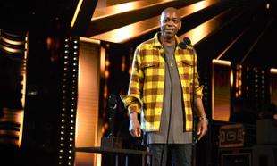 Video shows Dave Chappelle getting tackled while performing on stage Video shows Dave Chappelle getting tackled while performing on stage