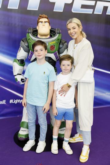 Pippa O'Connor pictured with sons Ollie and Louis at the special preview screening of Disney Pixar LIGHTYEAR in the Odeon Cinema Dublin. LIGHTYEAR will be in cinemas from June 17th. Picture Andres Poveda