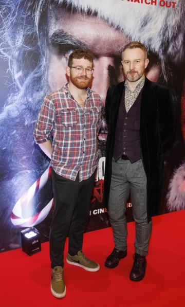 Jason Keegan and Ronan Hodson pictured at a special preview screening of Violent Night at Odeon Point Square, Dublin. Violent Night starring David Harbour is in cinemas from this Friday December 2nd. Picture Andres Poveda