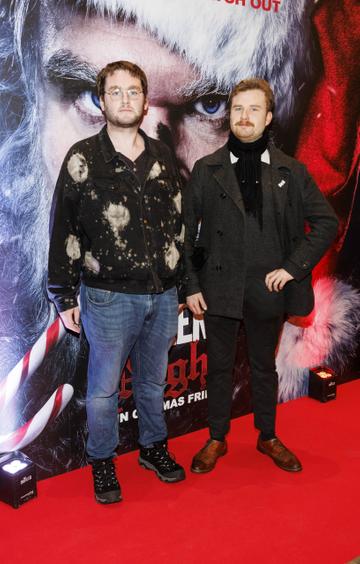 Joe Barry and Josh Arnold pictured at a special preview screening of Violent Night at Odeon Point Square, Dublin. Violent Night starring David Harbour is in cinemas from this Friday December 2nd. Picture Andres Poveda