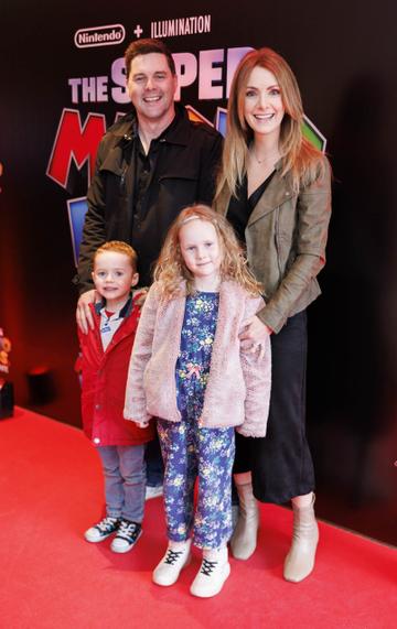 Marty Miller and Dee Woods with children Nathan (4) and Eleanor (6) pictured at the Irish premiere screening of The Super Mario Bros. Movie at Light House Cinema, Dublin. The Super Mario Bros. Movie is in cinemas from Wednesday April 5th. Picture Andres Poveda
 