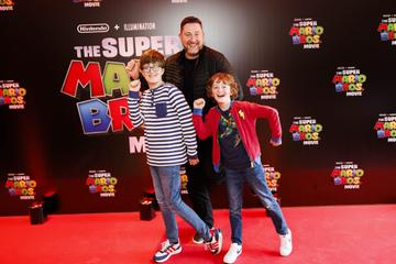 Ray Foley with Mathew (11)  and Andrew (8) pictured at the Irish premiere screening of The Super Mario Bros. Movie at Light House Cinema, Dublin. The Super Mario Bros. Movie is in cinemas from Wednesday April 5th. Picture Andres Poveda
 