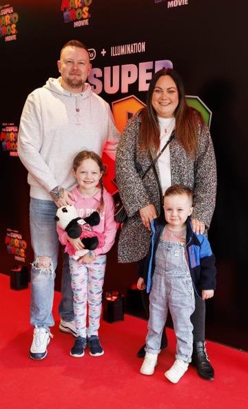 Grace Mongey and husband Chris Gernon with children Sienna and Hayden pictured at the Irish premiere screening of The Super Mario Bros. Movie at Light House Cinema, Dublin. The Super Mario Bros. Movie is in cinemas from Wednesday April 5th. Picture Andres Poveda
 