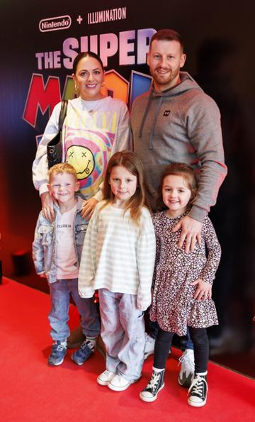 Danielle and Kevin Ollie (4) Everleigh (6) and Fiadg (5) pictured at the Irish premiere screening of The Super Mario Bros. Movie at Light House Cinema, Dublin. The Super Mario Bros. Movie is in cinemas from Wednesday April 5th. Picture Andres Poveda
 