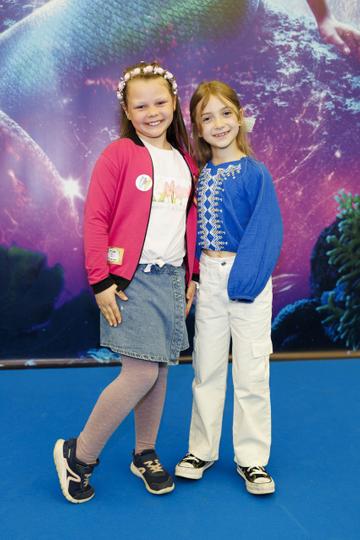 Elena Cieslik (8) and Olivia Bujak (8) pictured at the family premiere screening of Disney’s The Little Mermaid at the Odeon Point Village. Picture Andres Poveda