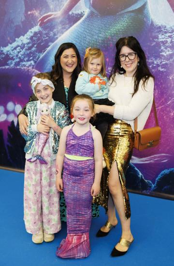 Lee Kenny with daughters Lilly (9) and Nina (6) and Chupi Sweetman with daughter Aya pictured at the family premiere screening of Disney’s The Little Mermaid at the Odeon Point Village. Picture Andres Poveda
