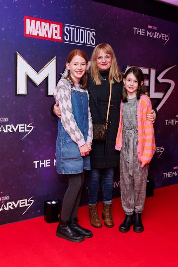 Eva Meade (11) and Niamh McGrath and Sarah Meade (9) pictured at the Irish Premiere screening of Marvel Studios The Marvels at Cineworld Dublin. In cinemas this Friday. Picture Andres Poveda